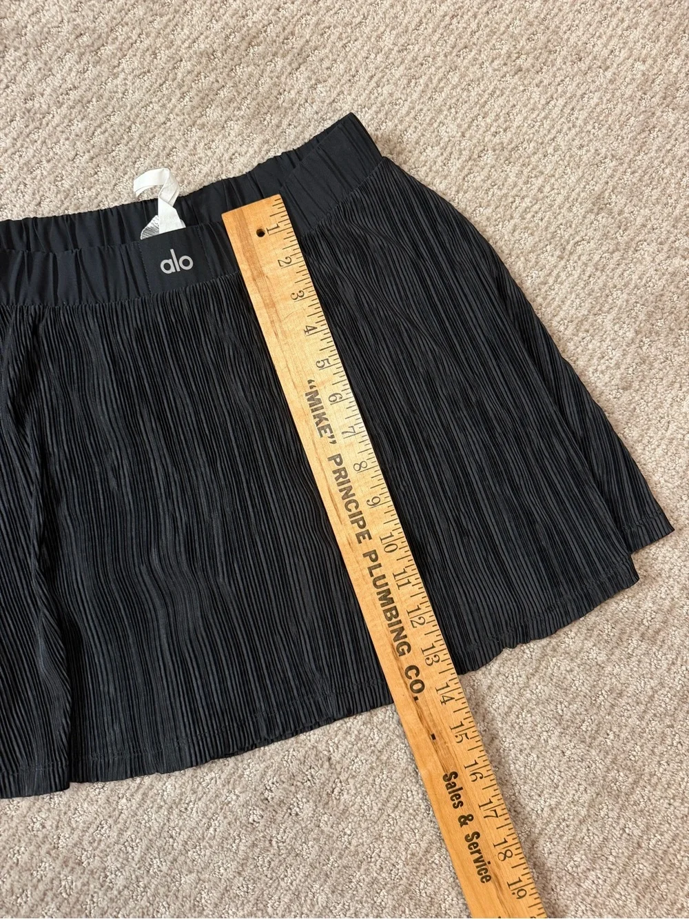 Woman’s black Alo Micro Plisse Tennis Skirt size small